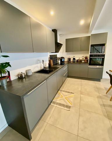 Maison 4 pièces avec terrasse et stationnements