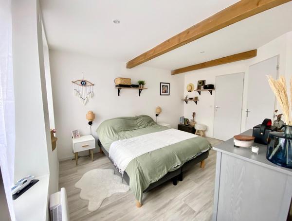 Maison 4 pièces avec terrasse et stationnements