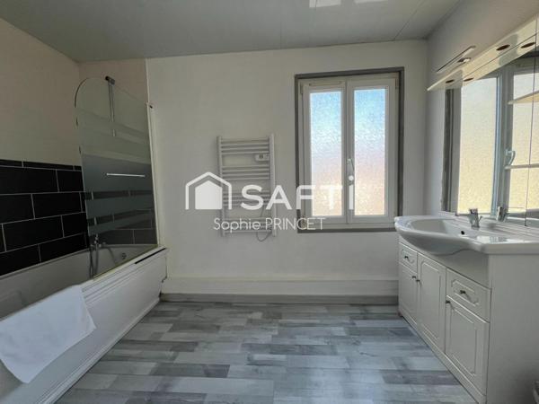 Maison familiale avec jardin et potentiel