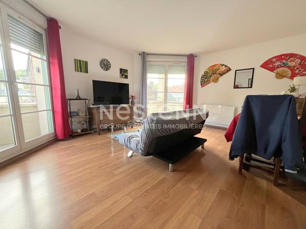 Appartement 3 pièces 65.52 m² - avec ascenseur - 1 place de parking en sous-sol - Centre-ville de MERU à 2 pas de la gare et des commerces