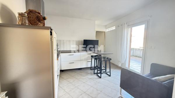 Apt (84400) Ensemble immobilier composé de deux appartements