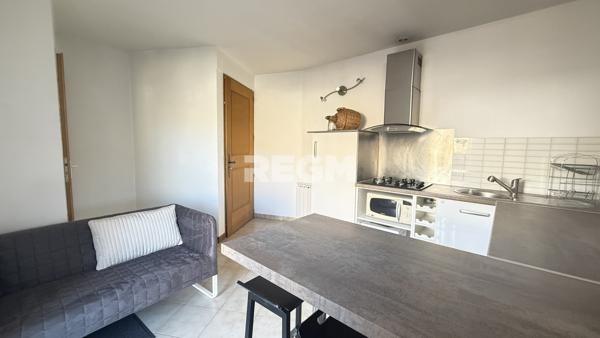 Apt (84400) Ensemble immobilier composé de deux appartements