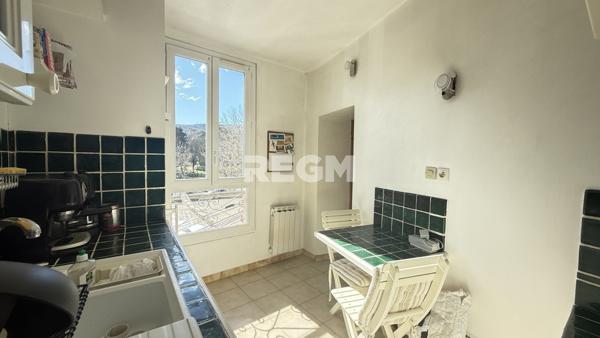 Apt (84400) Ensemble immobilier composé de deux appartements