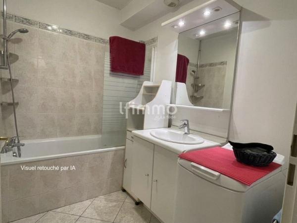 Appartement 3 pièces premier étage avec balcon et parking privatif