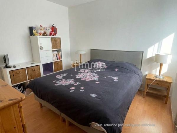 Appartement 3 pièces premier étage avec balcon et parking privatif