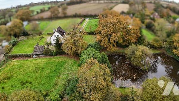 MAISON AVEC ETANG - BRICQUEBOSCQ