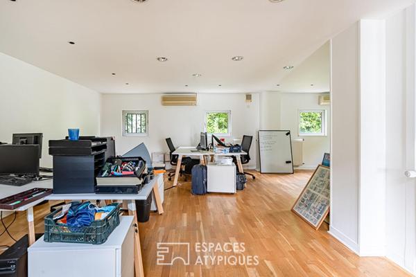 Bureaux transformables en maison-loft d’habitation avec toit-terrasse