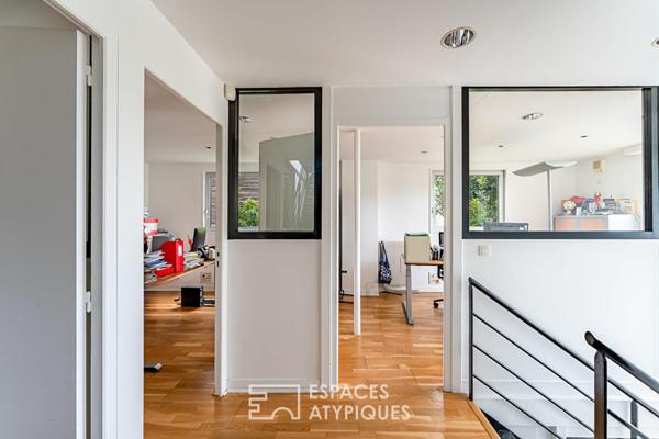 Bureaux transformables en maison-loft d’habitation avec toit-terrasse