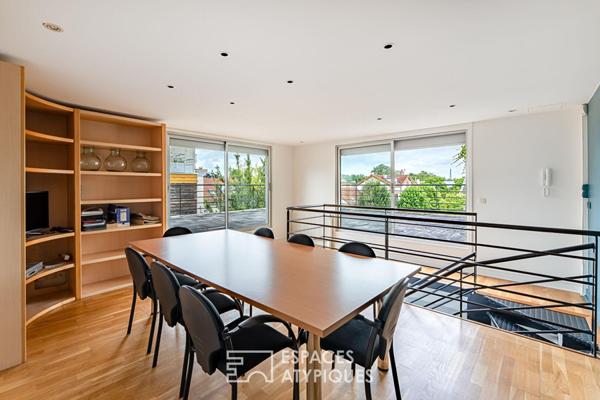 Bureaux transformables en maison-loft d’habitation avec toit-terrasse