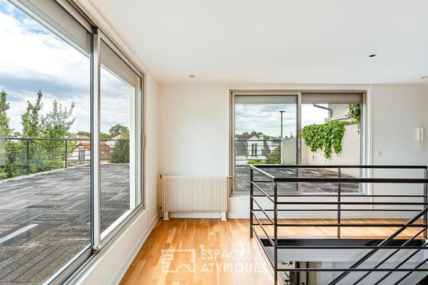 Bureaux transformables en maison-loft d’habitation avec toit-terrasse