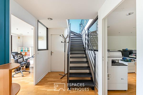 Bureaux transformables en maison-loft d’habitation avec toit-terrasse
