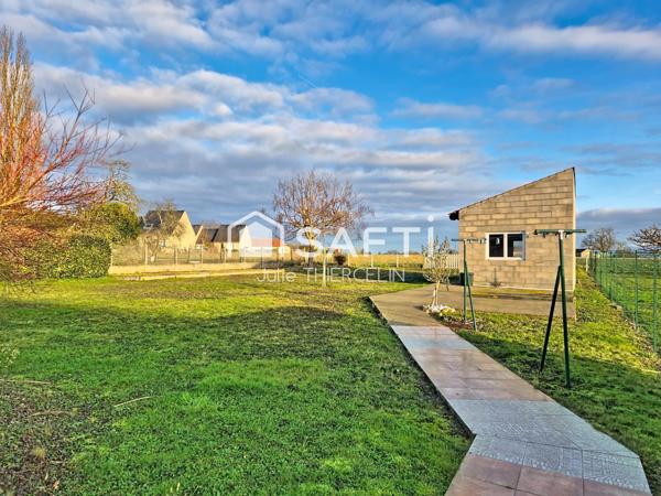 Maison familiale récente de 3 chambres avec garage et dépendance