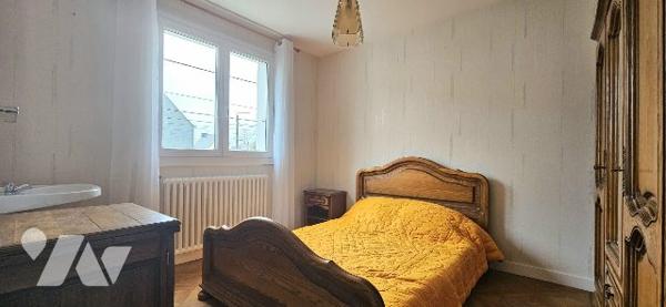 Maison de ville avec 4 chambre (possibilité 6) -  garage et jardin