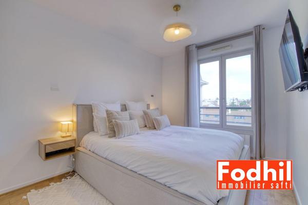 Superbe 3 pièces lumineux avec balcon, cave et deux parkings à proximité du centre-ville