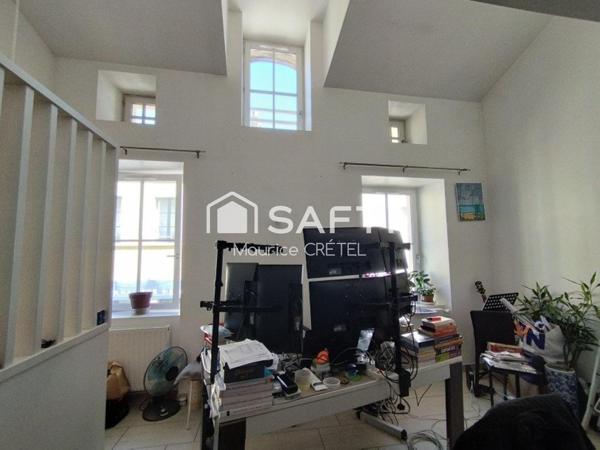 IMMEUBLE LOCATIF+COMMERCE