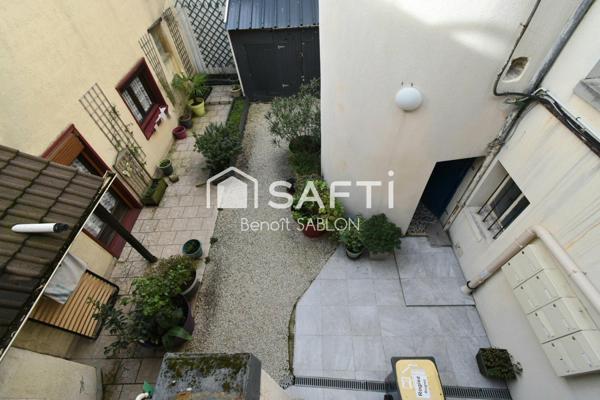 Appartement 58m², 2 chambres, grenier et cour.