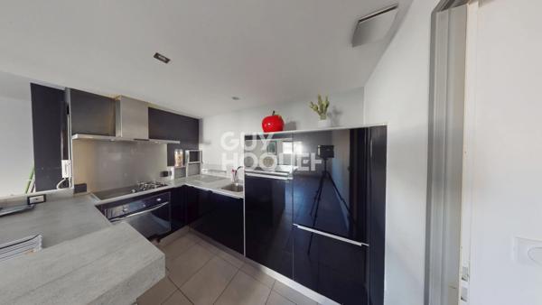 Appartement 3 pièces de 64 m² + terrasse + parking en sous-sol