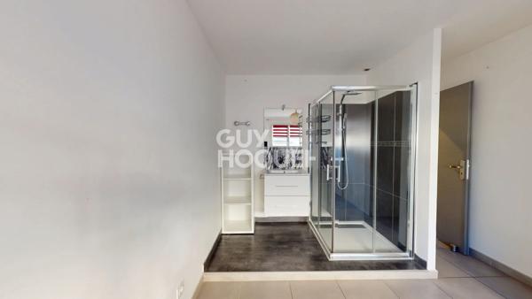 Appartement 3 pièces de 64 m² + terrasse + parking en sous-sol