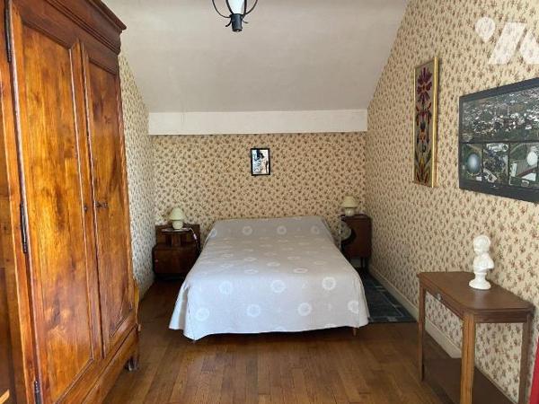 SAINT-PAUL-DES-LANDES, sur 2095 m² de terrain, maison comprenant au rez-de-chaussée : garage, c...