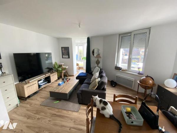 Denain, Immeuble de rapport à usage mixte.
