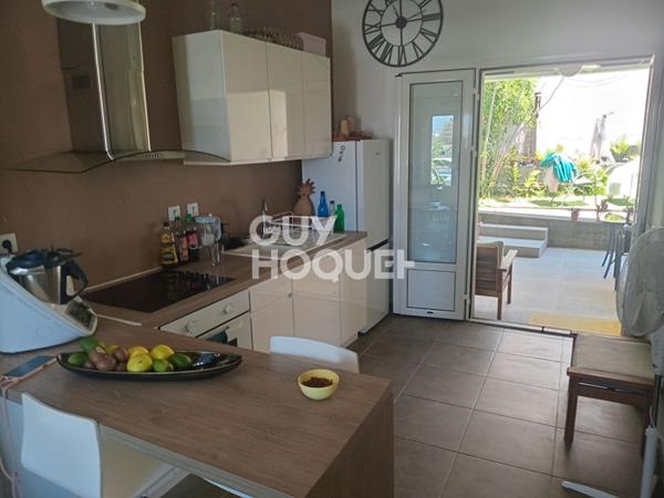Appartement Saint Benoit 3 pièce(s) 50.46 m2 avec jardin