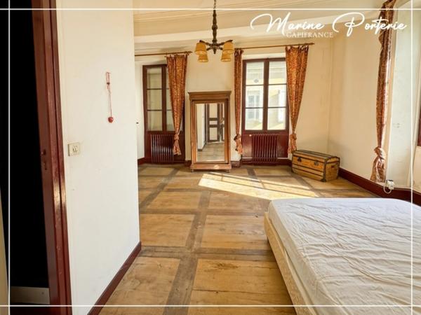 Maison de maître à révéler au cœur de Jegun – charme, volumes et cachet exceptionnel