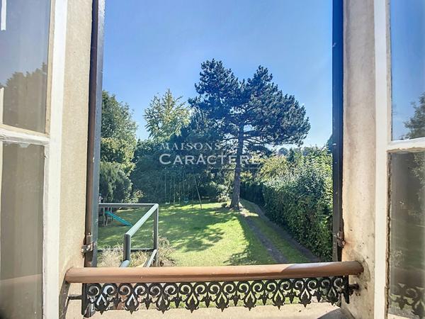 Maison d’époque au jardin extraordinaire de 1400m2 au coeur de ville