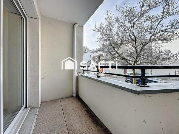 T2 avec balcon et place de stationnement