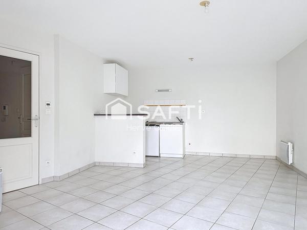 T2 avec balcon et place de stationnement