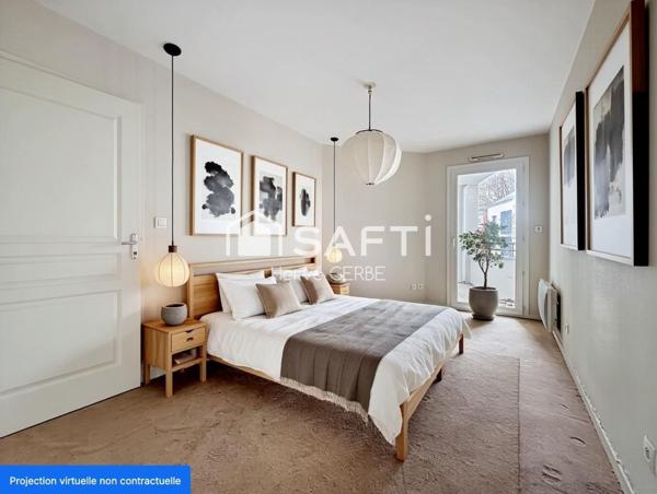 T2 avec balcon et place de stationnement