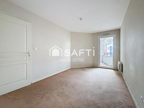 T2 avec balcon et place de stationnement