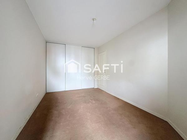 T2 avec balcon et place de stationnement