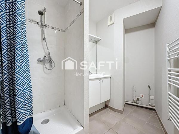 T2 avec balcon et place de stationnement