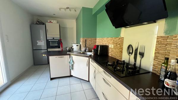 Maison 4 chambres avec vie de plain-pied, jardin et garage au calme près de Pluvigner