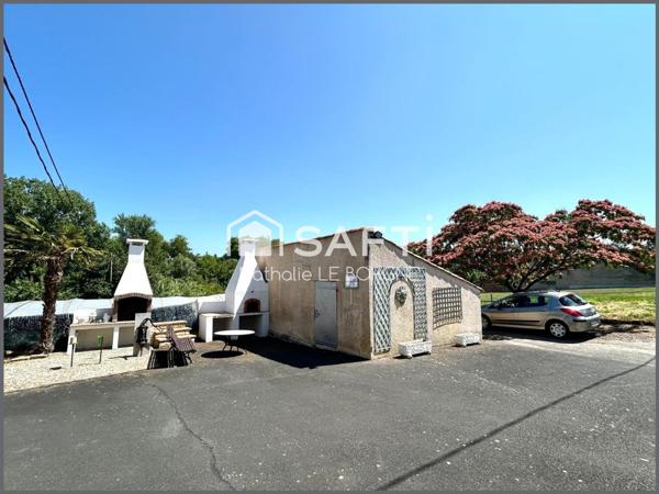 Ensemble immobilier avec maison / hangars /annexes