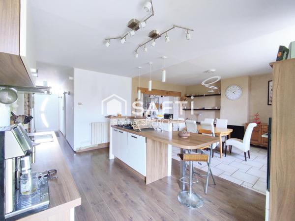 Charmante maison avec garage et jardin