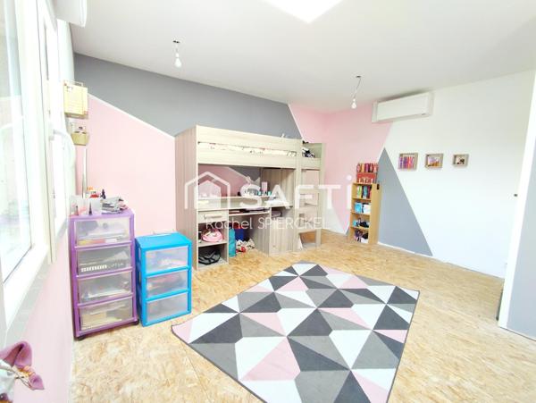 Charmante maison avec garage et jardin