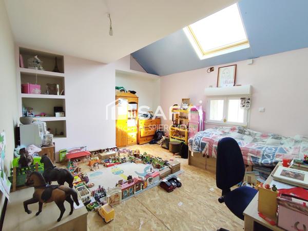 Charmante maison avec garage et jardin