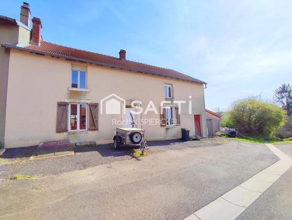 Charmante maison avec garage et jardin