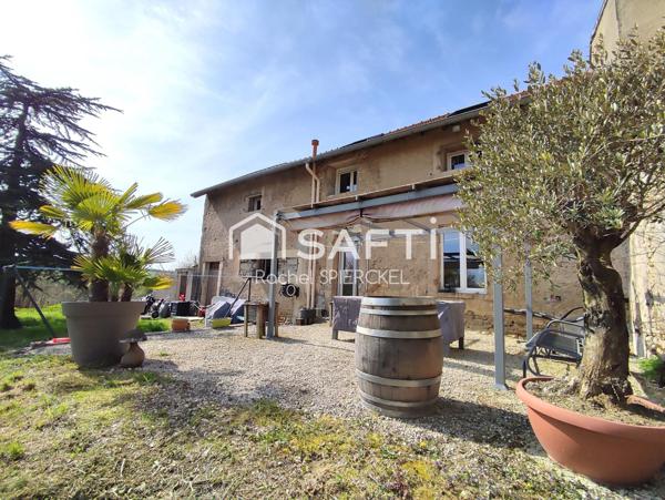 Charmante maison avec garage et jardin