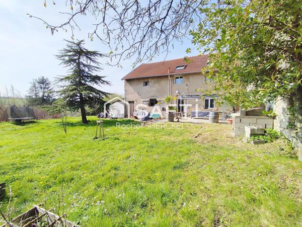 Charmante maison avec garage et jardin