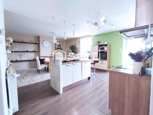 Charmante maison avec garage et jardin