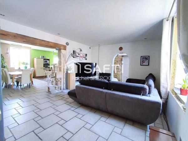 Charmante maison avec garage et jardin