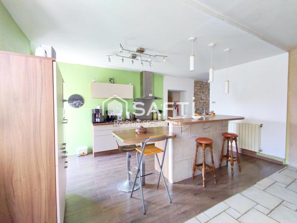 Charmante maison avec garage et jardin