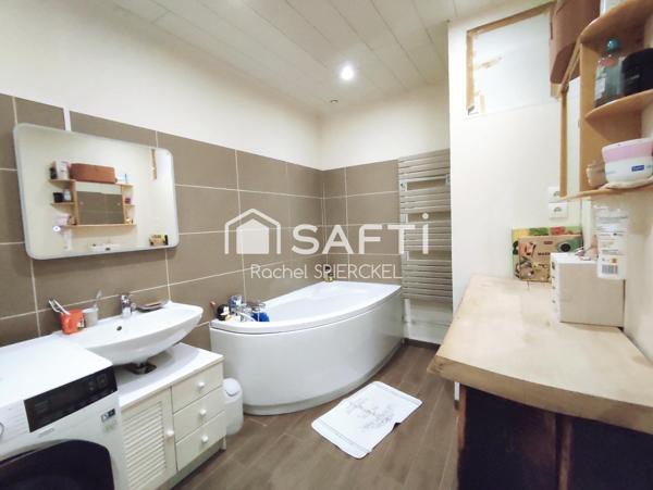 Charmante maison avec garage et jardin