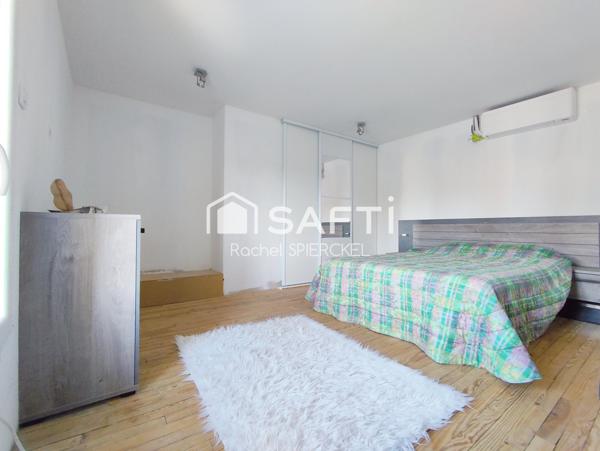 Charmante maison avec garage et jardin