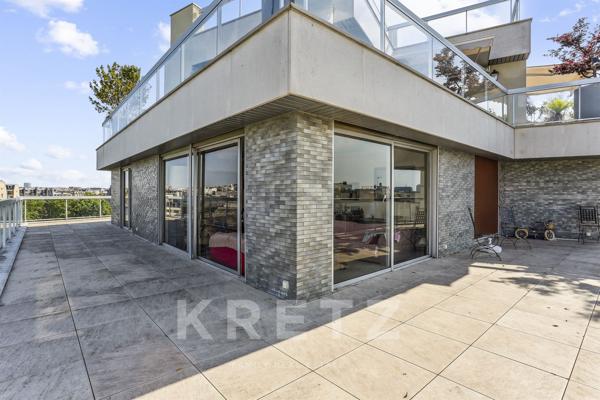 Appartement avec terrasse à 180° sur Paris