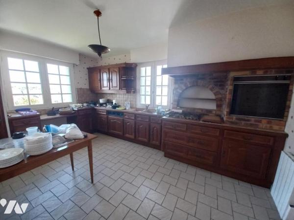 Grande maison plein centre