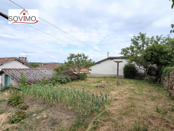 AU COEUR DU BOURG, ENSEMBLE IMMOBILIER PLEIN DE POTENTIEL AVEC JARDINET ET GARAGE