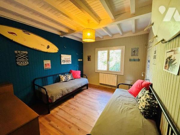 À seulement quelques pas du Bassin, quartier des 44 Hectares au Cap Ferret, cette charmante mai...